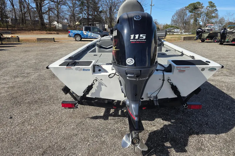 Slide: The Image of 2020 G3 Sportsman 1810 boat with Yamaha 115 outboard motor, parked outdoors. - 5