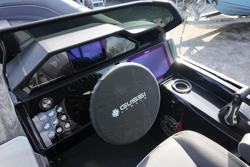 Slide: The Image of Interior of 2026 Viaggio Diamante D24U boat with modern steering and control panel. - 11