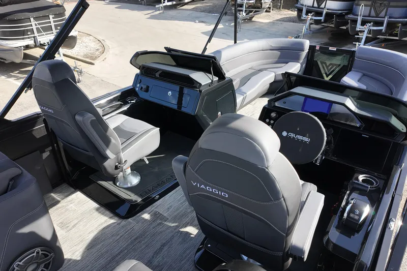Slide: The Image of Interior of 2026 Viaggio Diamante D24U boat with modern seating and control panel. - 4