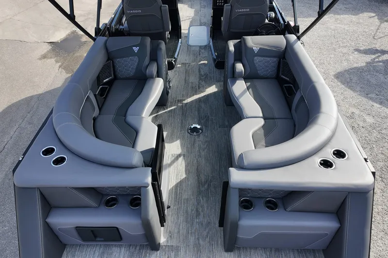 Slide: The Image of Luxurious interior of 2026 Viaggio Diamante D24U pontoon boat with plush gray seating. - 9