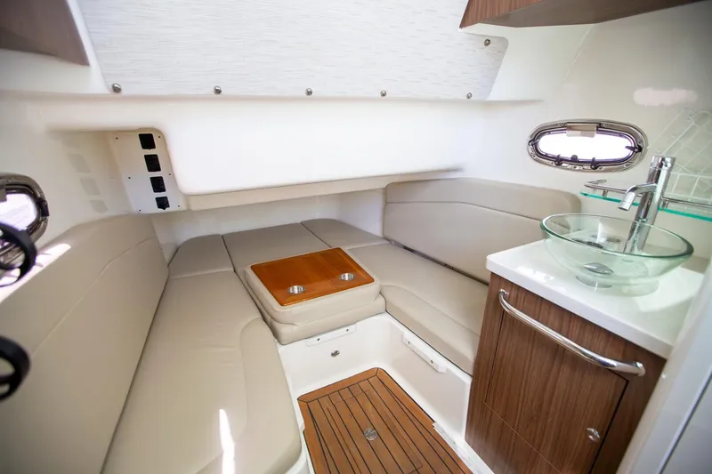 Slide: The Image of Luxurious interior of 2019 Boston Whaler 380 Outrage with seating and sink. - 14
