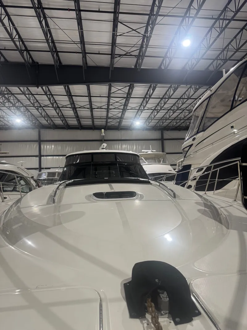Slide: The Image of 2006 Sea Ray 52 Sundancer in a storage facility. - 1