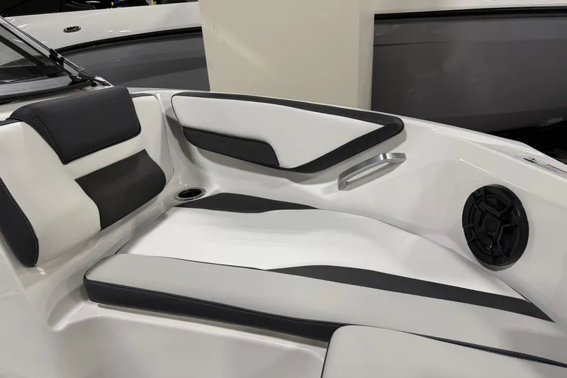 Slide: The Image of 2026 Yamaha Boats AR195 interior seating with sleek black and white design. - 6
