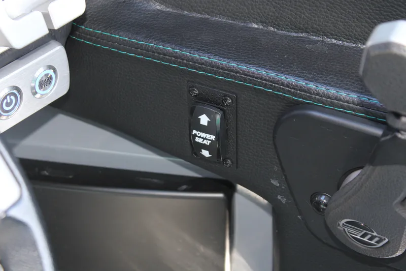 Slide: The Image of 2020 Malibu Wakesetter 25 LSV power seat control and start/stop button. - 19