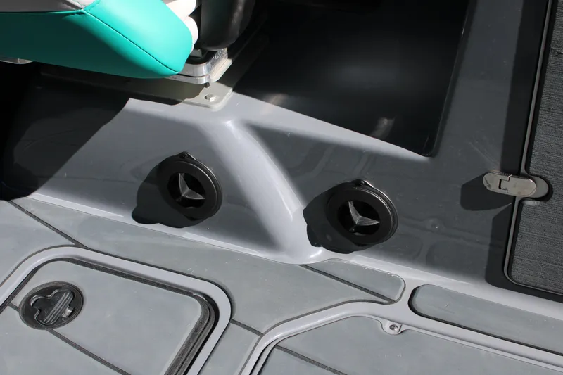 Slide: The Image of 2020 Malibu Wakesetter 25 LSV interior detail with teal seat and gray flooring. - 20