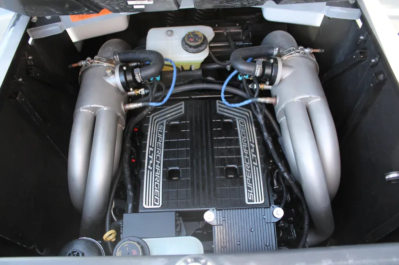 Slide: The Image of 2020 Malibu Wakesetter 25 LSV engine compartment with supercharged components. - 22