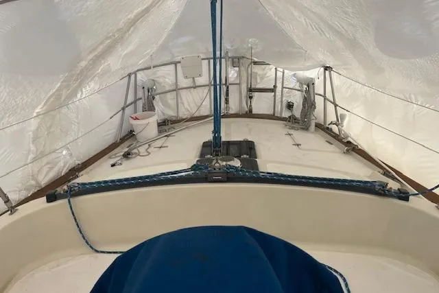 Slide: The Image of 1987 Irwin 43 Mk II Cruiser sailboat deck under protective cover. - 19