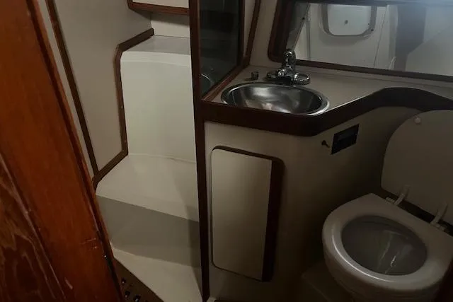 Slide: The Image of Bathroom interior of 1987 Irwin 43 Mk II Cruiser with sink and toilet. - 44