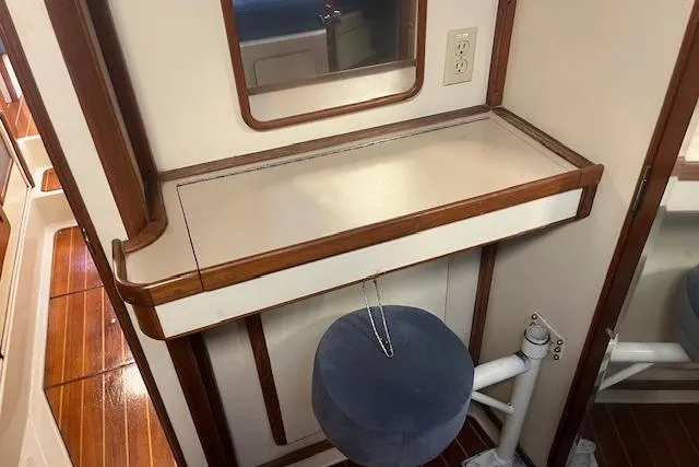 Slide: The Image of Interior of 1987 Irwin 43 Mk II Cruiser with wooden vanity and mirror. - 68