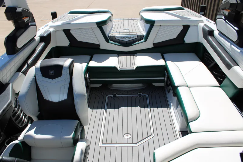 Slide: The Image of 2021 Nautique Super Air Nautique G21 interior with luxurious seating and modern design. - 17
