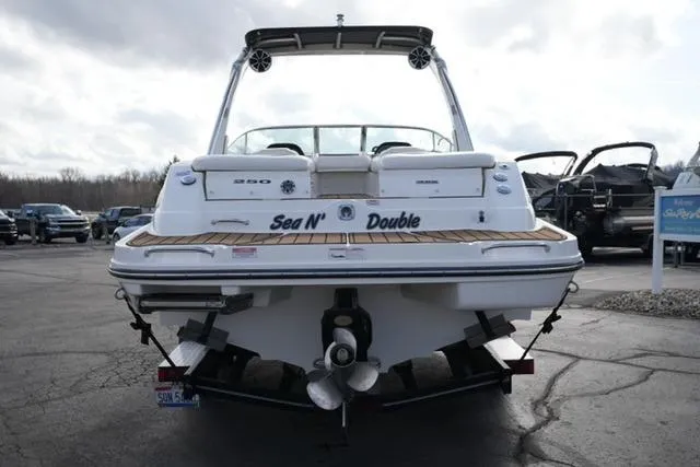 Slide: The Image of Rear view of a 2008 Sea Ray SLX 250 boat on a trailer. - 6