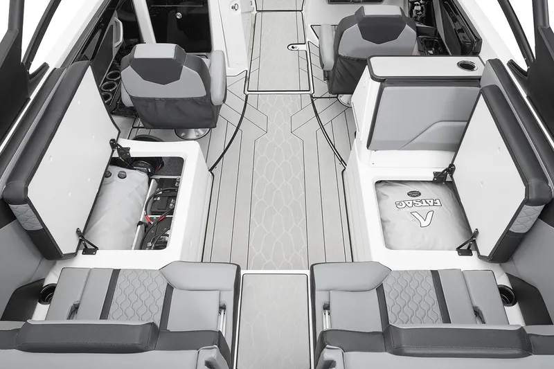 Slide: The Image of Manufacturer Provided Image: 2026 Yamaha Boats 255XE interior with open storage compartments and modern seating design. - 16
