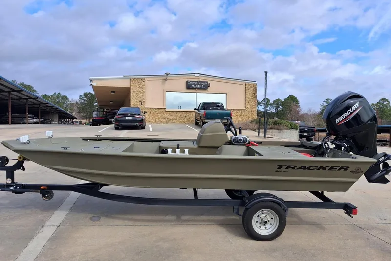 Slide: The Image of 2023 G3 Gator Tough 18 CC boat with Mercury engine on trailer. - 4