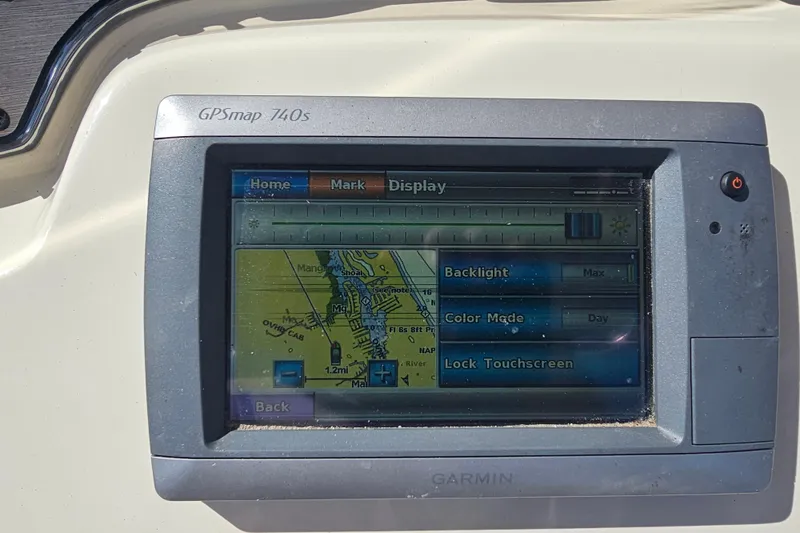 Slide: The Image of Garmin GPSmap 740s on 2016 Scout 210 XSF boat, displaying navigation map. - 33