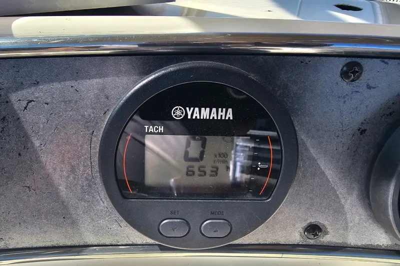 Slide: The Image of Yamaha tachometer on 2016 Scout 210 XSF boat dashboard. - 38