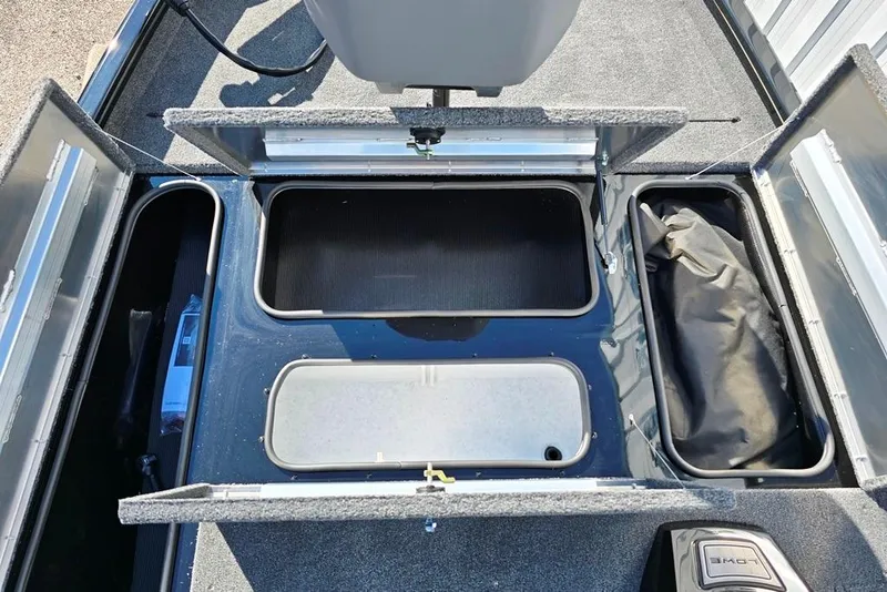 Slide: The Image of 2026 Lowe Stinger 175 boat storage compartments with open lids, showcasing ample space. - 5