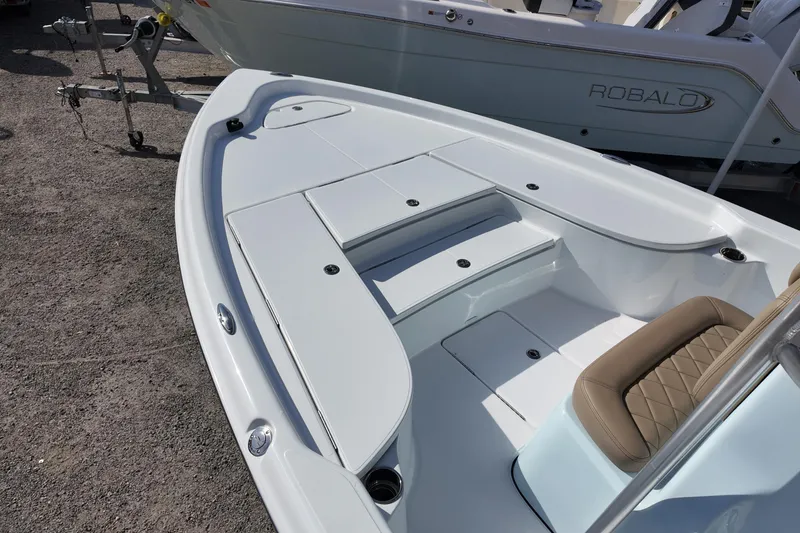 Slide: The Image of 2026 Blazer PureBay 2200 boat interior with seating and storage compartments. - 6