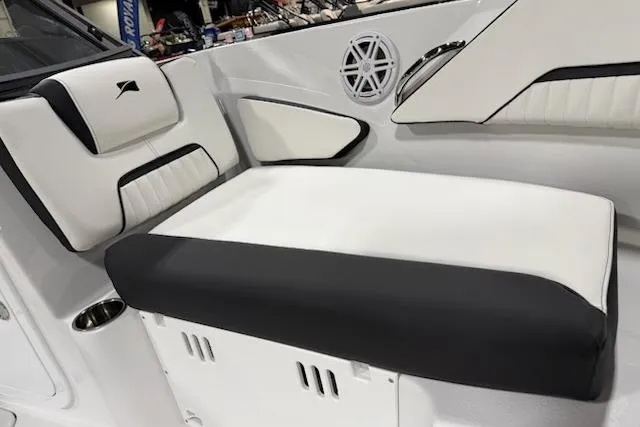 Slide: The Image of 2026 Stingray 20 SBX boat interior with sleek white and black seating design. - 7
