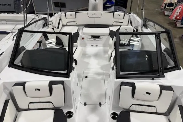Slide: The Image of 2026 Stingray 20 SBX boat interior with sleek white and black seating design. - 8