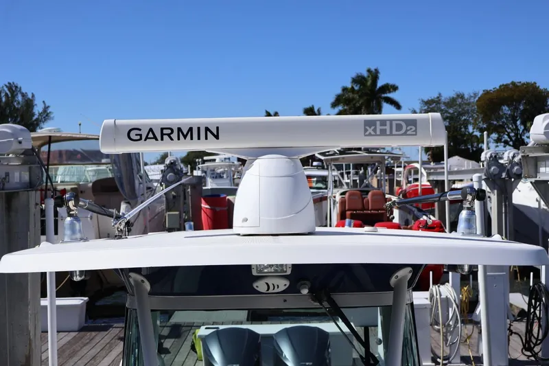 Slide: The Image of 2011 Everglades 320 Center Console with Garmin xHD2 radar at marina. - 19