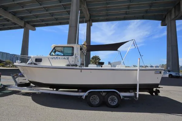 Slide: The Image of Parker Marine 2520 Sport Cabin 2000 - 1