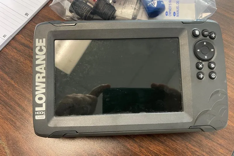 Slide: The Image of Lowrance Hook 7x HDI fish finder on a 2019 Carolina Skiff 198 DLV boat. - 10