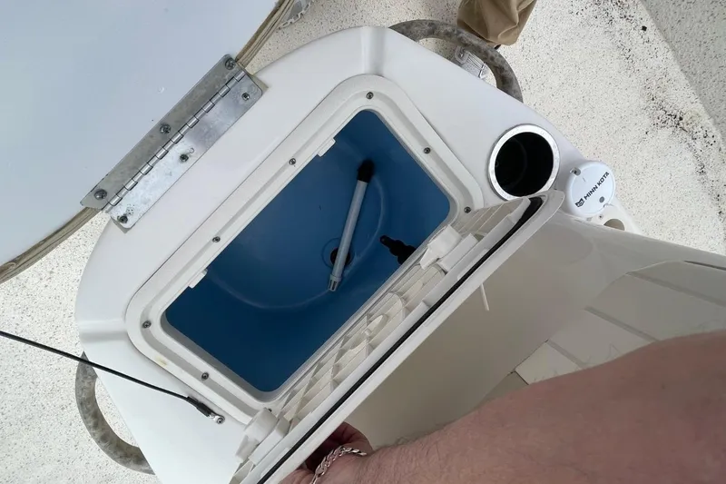 Slide: The Image of Open storage compartment on a 2019 Carolina Skiff 198 DLV boat. - 22