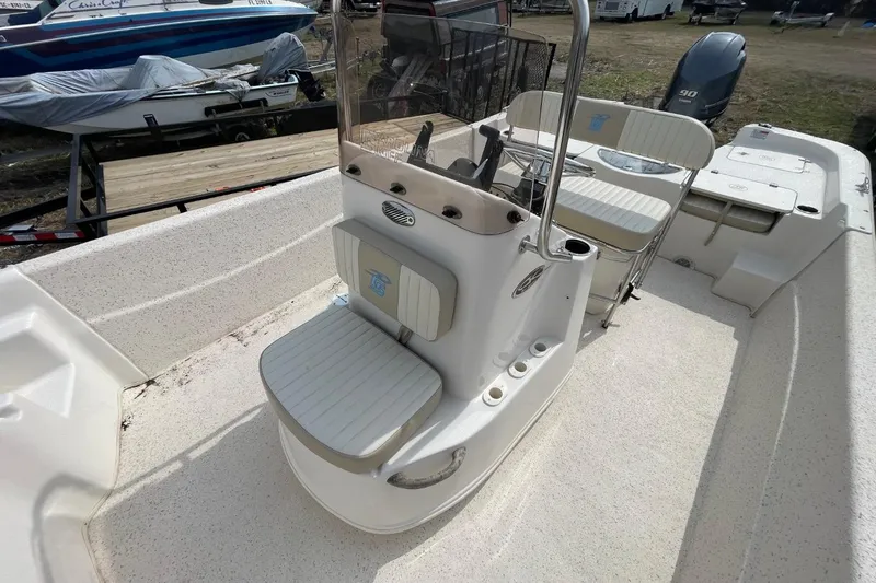 Slide: The Image of 2019 Carolina Skiff 198 DLV boat interior with seating and console. - 27