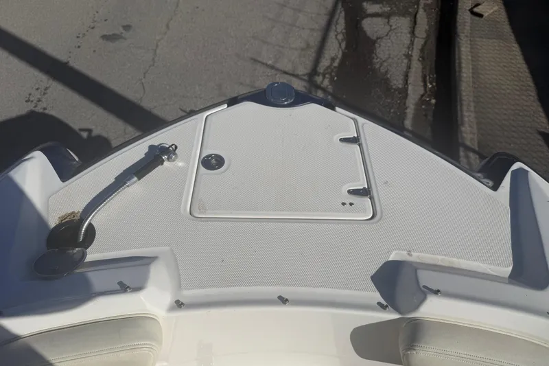 Slide: The Image of Bow of 2015 Chaparral 244 Sunesta boat with anchor storage compartment. - 5
