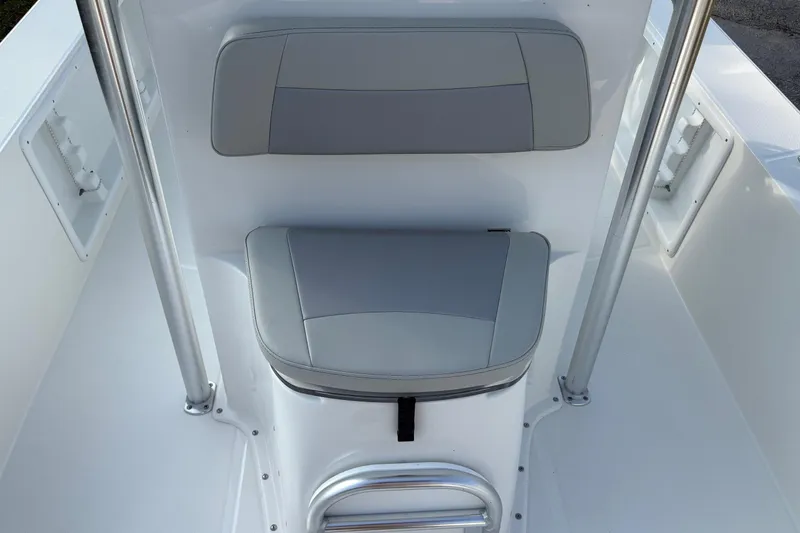 Slide: The Image of Bay Rider 2460 FS Skiff 2026 model, featuring sleek seating and stainless steel railings. - 11