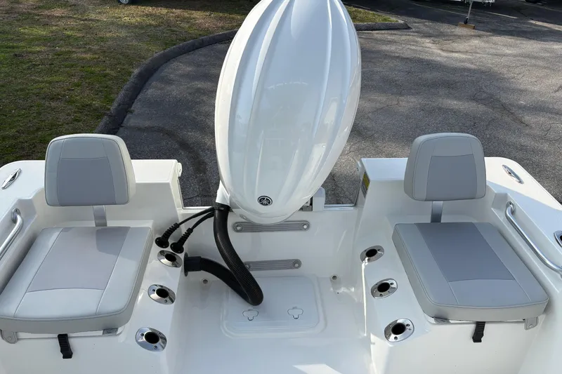 Slide: The Image of Bay Rider 2460 FS Skiff 2026 with gray seats and motor. - 6