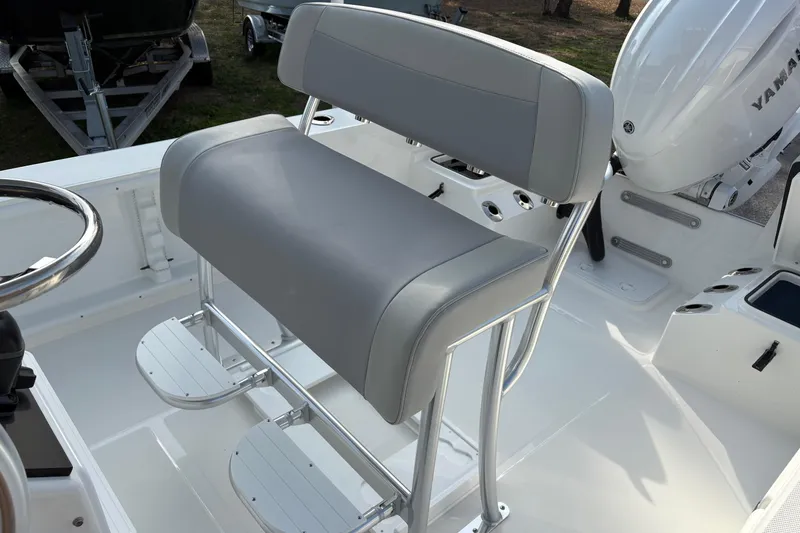 Slide: The Image of Bay Rider 2460 FS Skiff 2026 with gray seat and Yamaha engine. - 10