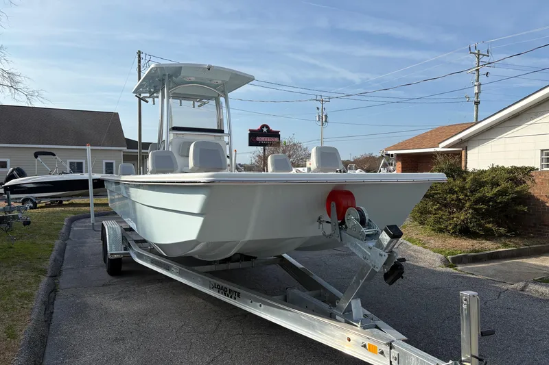 Slide: The Image of 2026 Bay Rider 2460 FS Skiff on trailer, side view. - 5