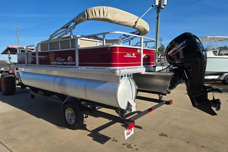 Slide: The Image of 2023 Sun Tracker Bass Buggy 18 DLX pontoon boat with Mercury outboard motor. - 3