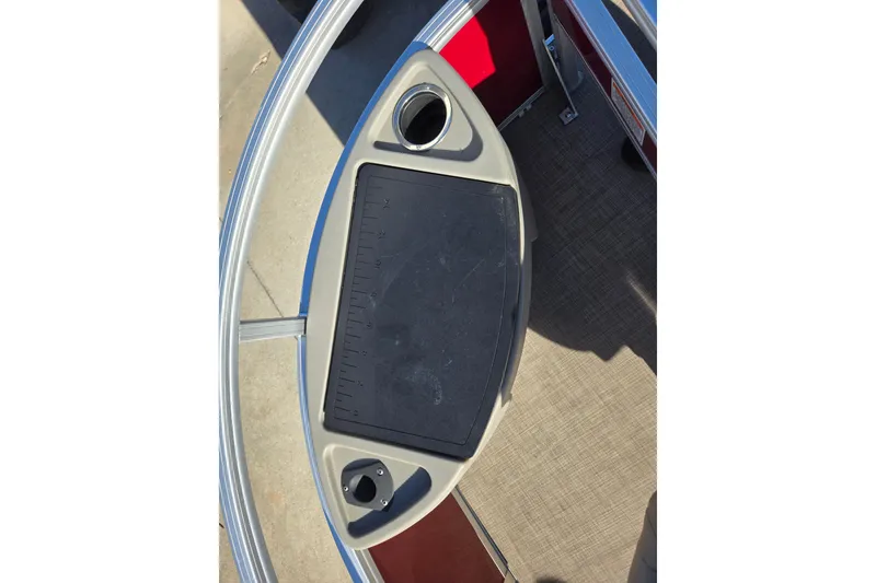 Slide: The Image of 2023 Sun Tracker Bass Buggy 18 DLX fishing station with cup holder and measuring board. - 8