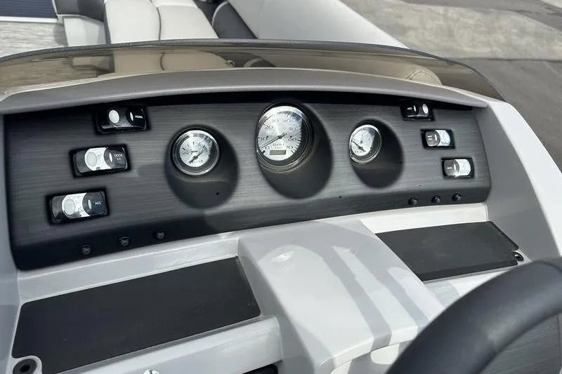 Slide: The Image of Dashboard of 2021 Bennington 21 SSBX boat with gauges and controls. - 11