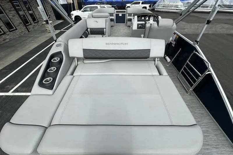 Slide: The Image of 2021 Bennington 21 SSBX pontoon boat with spacious seating and modern design. - 22