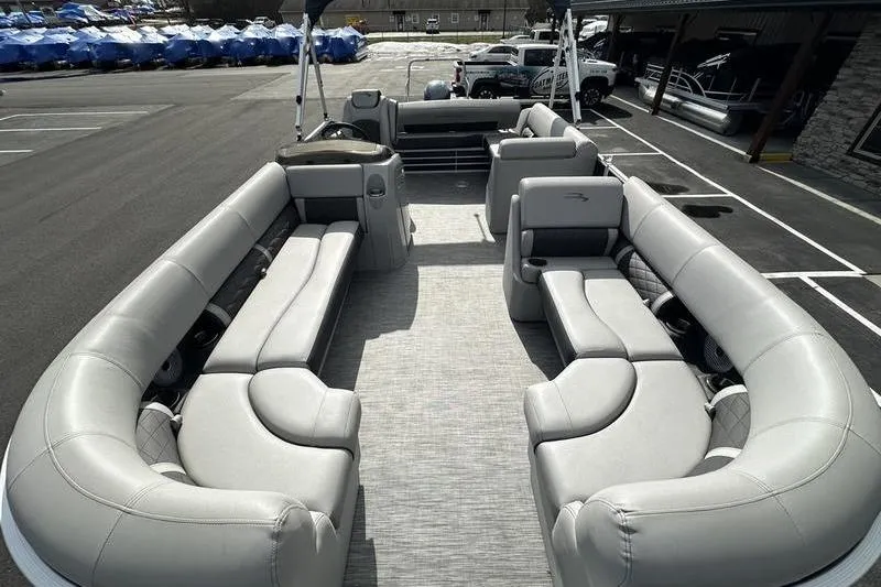 Slide: The Image of 2021 Bennington 21 SSBX pontoon boat with spacious seating and modern design. - 8