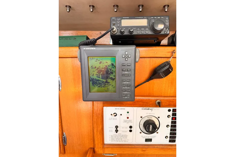 Slide: The Image of Navigation equipment on a 1995 Catalina 36 MkII sailboat dashboard. - 10