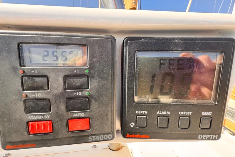 Slide: The Image of Autopilot and depth display on 1995 Catalina 36 MkII sailboat dashboard. - 22