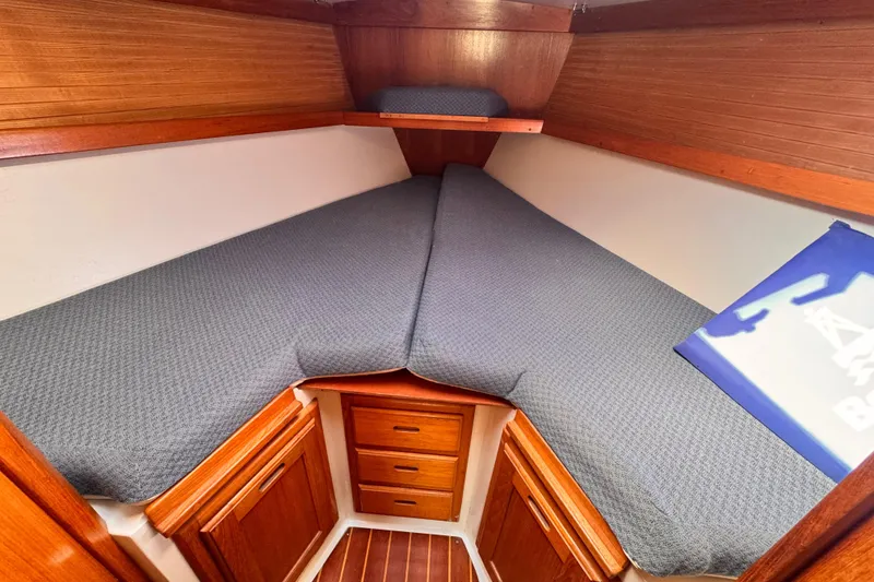 Slide: The Image of Cozy V-berth cabin in 1995 Catalina 36 MkII sailboat with wooden cabinetry. - 8