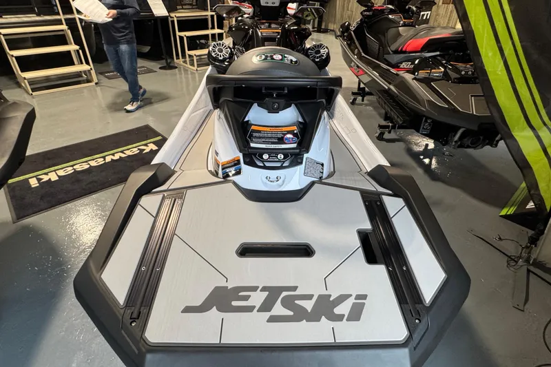 Slide: The Image of 2026 Kawasaki STX160LX Jet Ski in showroom, showcasing sleek design and advanced features. - 5