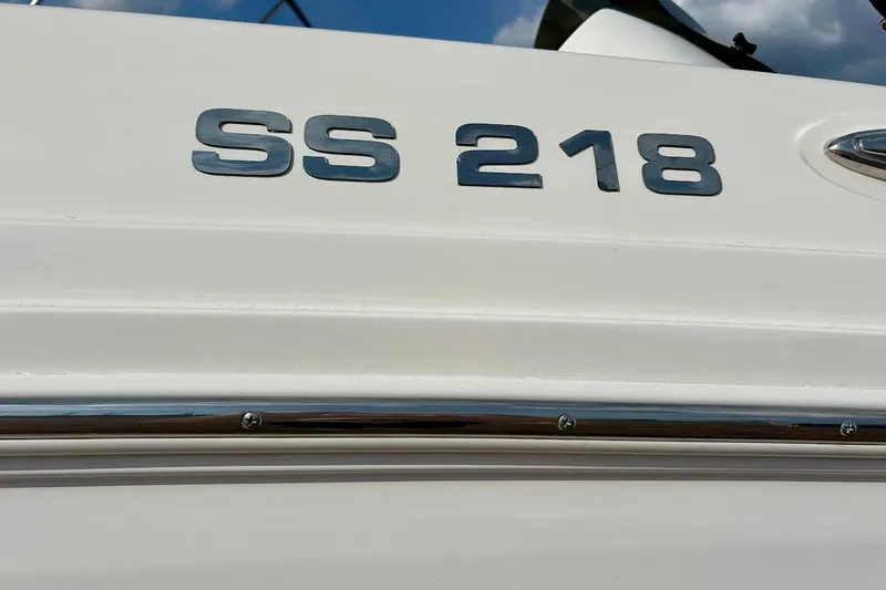 Slide: The Image of 2024 Hurricane Kayaks SS 218 model nameplate on white surface. - 11