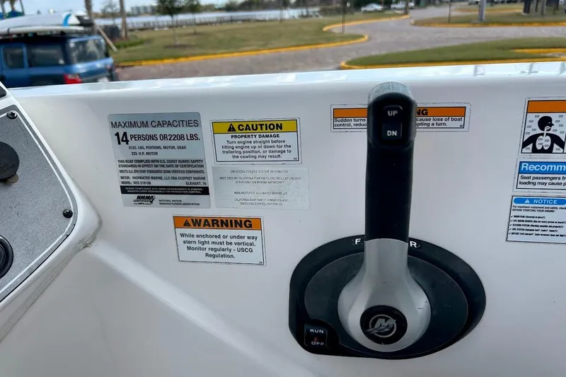 Slide: The Image of Control panel of 2024 Hurricane Kayaks SS 218 with capacity and safety warnings. - 15