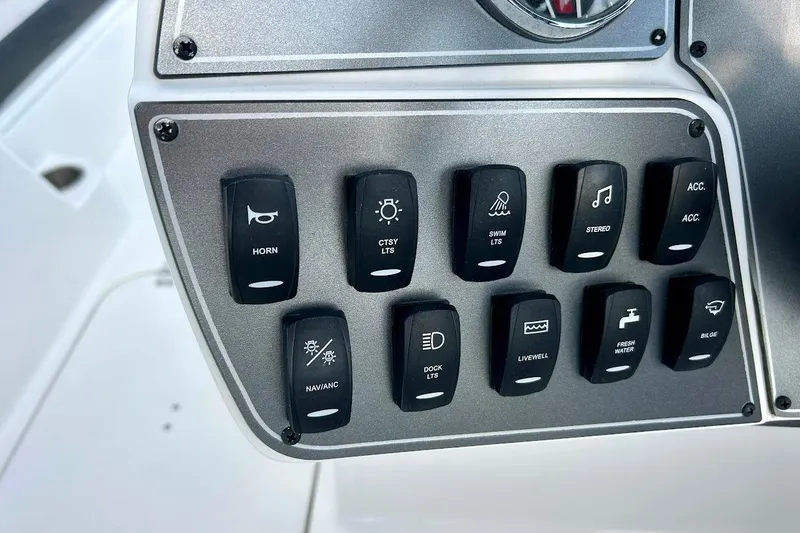 Slide: The Image of Control panel of 2024 Hurricane Kayaks SS 218 with labeled switches for various functions. - 17