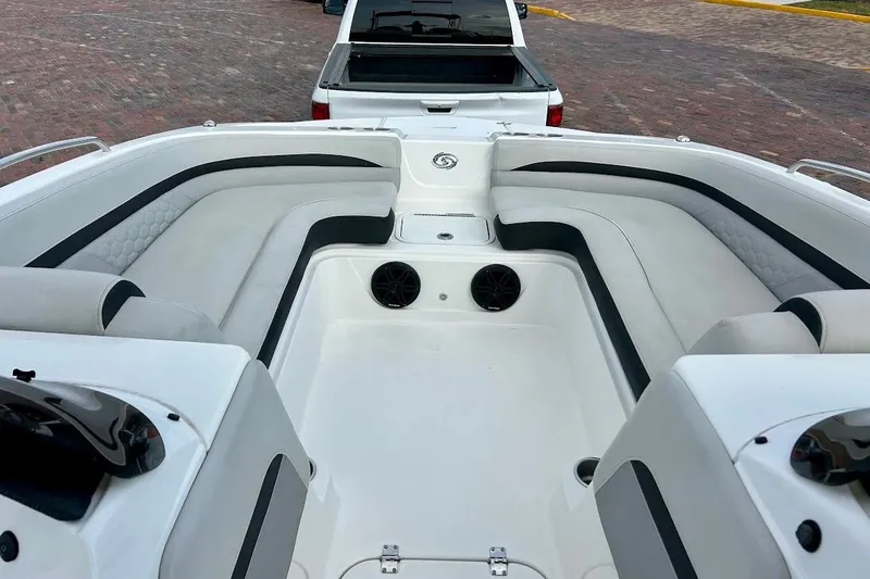 Slide: The Image of 2024 Hurricane Kayaks SS 218 interior with white seating and black accents. - 23