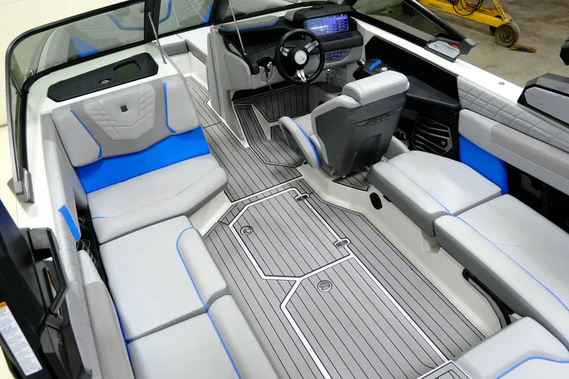 Slide: The Image of Interior of 2023 Nautique G23 boat with modern seating. - 11