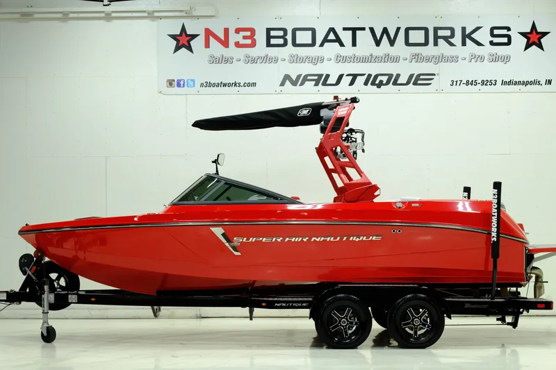 Slide: The Image of Red 2018 Nautique 210 boat at N3 Boatworks. - 5