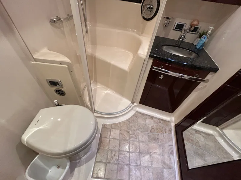Slide: The Image of Sea Ray 610 Sundancer 2010 bathroom with shower and sink. - 36