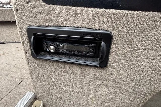 Slide: The Image of 2003 Monark King 190 interior with JVC stereo system installed in carpeted panel. - 20